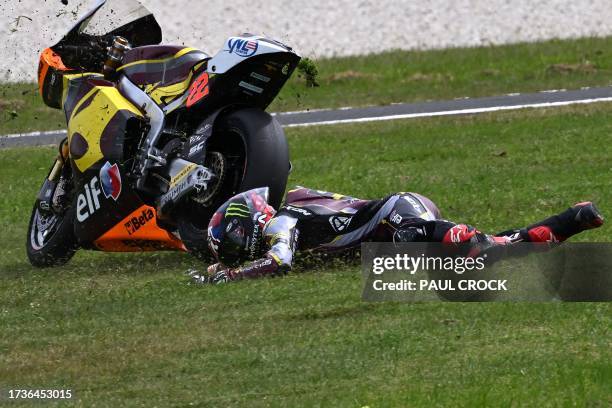 Elf Marc VDS Rasing Team's British rider Sam Lowes slides off the track during the Moto2 class qualifying session of the MotoGP Australian Grand Prix...