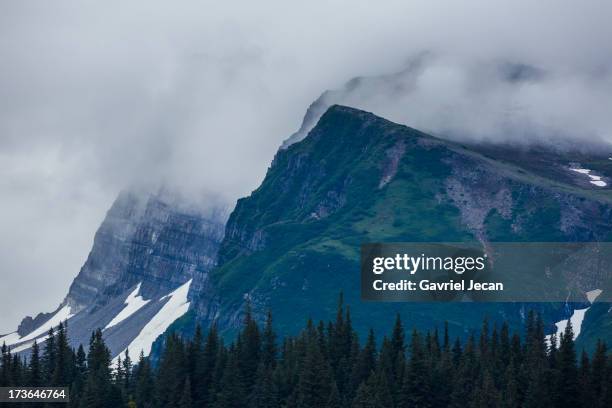 chigmit mountains in lake clark np. - chigmit mountains stock pictures, royalty-free photos & images