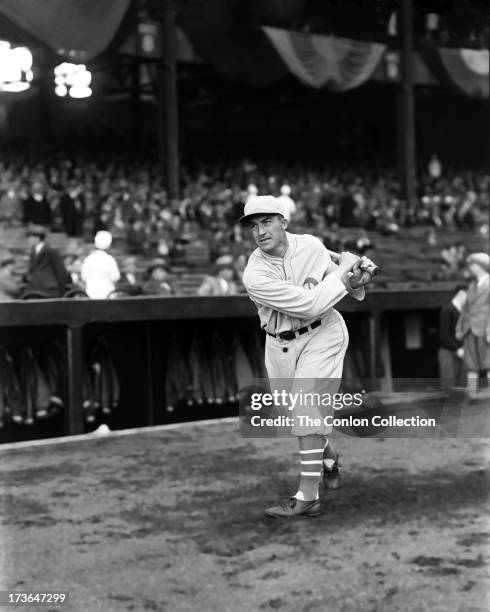 Aloysius H. Simmons of the Philadelphia Athletics swinging a bat in 1930.
