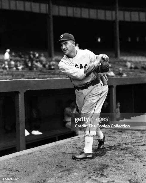 Aloysius H. Simmons of the Cincinnati Reds swinging a bat in 1939.