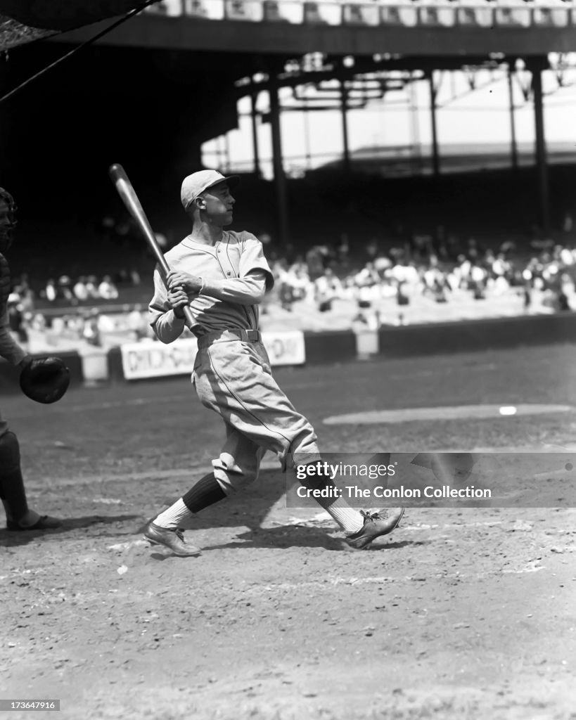 Clyde L. Sukeforth of the Cincinnati Reds swinging a bat in 1930. News ...