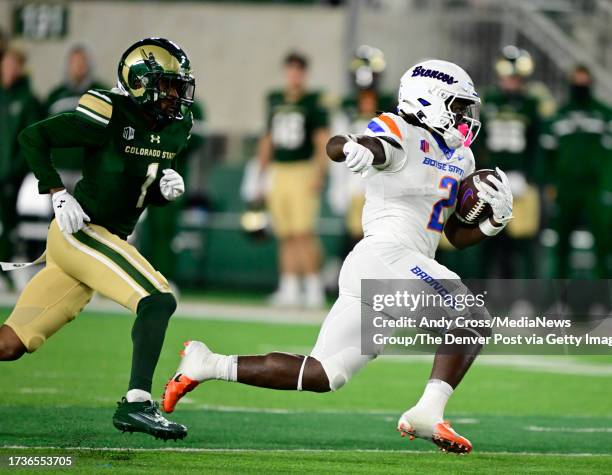 Boise State Broncos running back Ashton Jeanty finds running room against Colorado State Rams defensive back Chigozie Anusiem in the first quarter at...