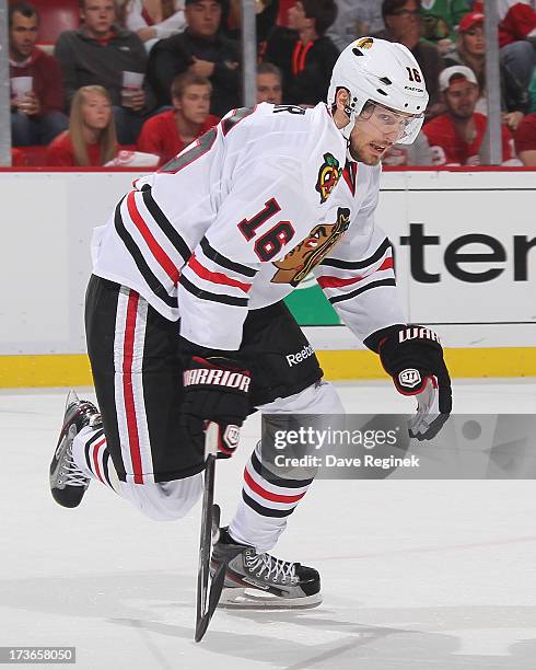 Marcus Kruger of the Chicago Blackhawks skates up ice during Game Six of the Western Conference Semifinals against the Detroit Red Wings during the...