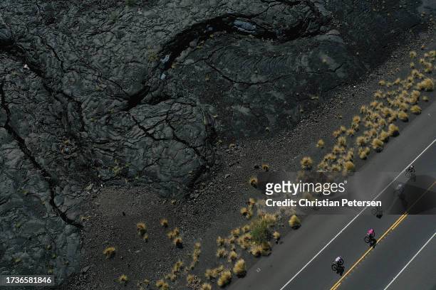 An aerial view as athletes compete on the bike during the VinFast IRONMAN World Championship on October 14, 2023 in Kailua Kona, Hawaii.
