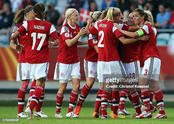 The team of Denmark celebrates the first goal of Mia Brogaard during the UEFA Women's EURO 2013 Group A match between Denmark and Finland at Gamla...
