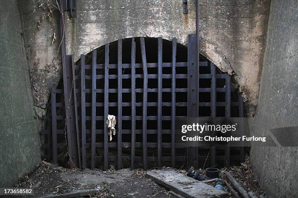 The mine entrance of 17 Shaft at Crown Mines is sealed off with disused rail tracks on July 16, 2013 in Johannesburg, South Africa. Johannesburg...