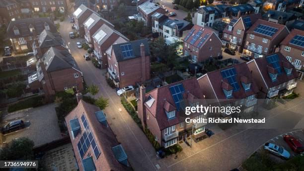 sustainable housing at dusk - solar street light stock pictures, royalty-free photos & images