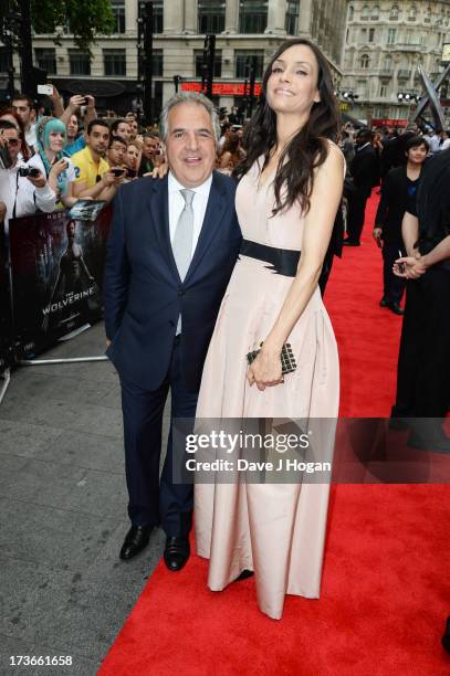 Famke Janssen and Jim Gianopilos attend the UK premiere of 'The Wolverine' at The Empire Leicester Square on July 16, 2013 in London, England.