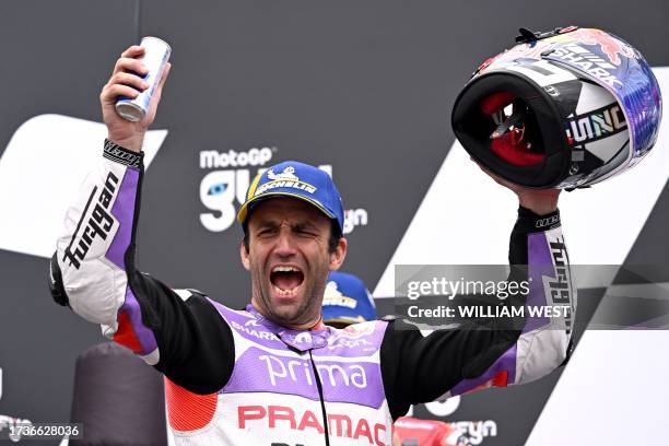 Prima Pramac's French rider Johann Zarco celebrates his victory on the podium after the MotoGP Australian Grand Prix at Phillip Island on October 21,...