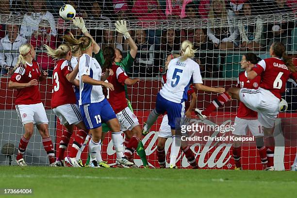 Annica Sjoelund of Finland scores the first goal during the UEFA Women's EURO 2013 Group A match between Denmark and Finland at Gamla Ullevi Stadium...