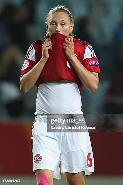 Mariann Knudsen of Denmark looks dejected after the UEFA Women's EURO 2013 Group A match between Denmark and Finland at Gamla Ullevi Stadium on July...