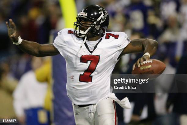 Quarterback Michael Vick of the Atlanta Falcons celebrates his game-winning touchdown run in overtime against the Minnesota Vikings on December 1,...