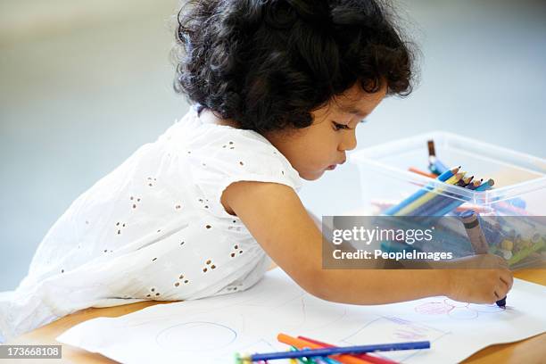 enjoying her creativity - kid holding crayons stock pictures, royalty-free photos & images