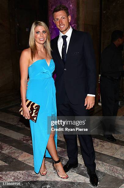 James Pattinson of Australia and his partner Kayla Dickson arrive for the Australian Cricket Team visit to the Australian High Commision on July 16,...