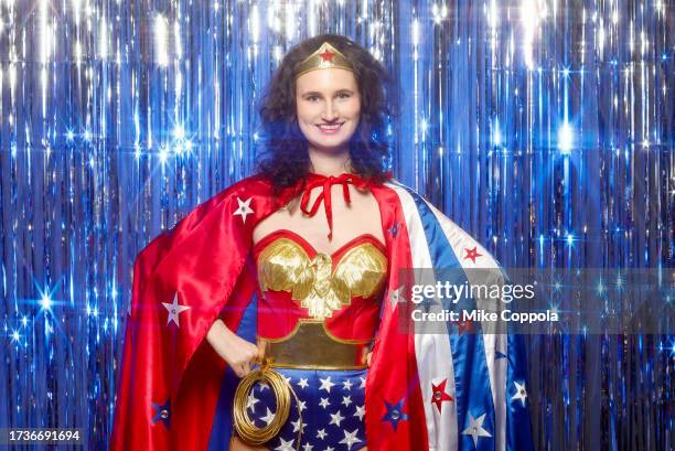 Cosplayer dressed as Wonder Woman poses for a photo during New York Comic Con at Javits Center on October 14, 2023 in New York City.