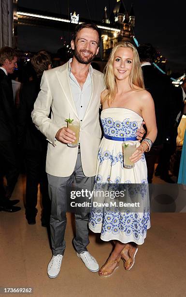 Anthony Howell and Miranda Raison attend the Johnnie Walker Blue Label drinks reception aboard the John Walker & Sons Voyager on July 16, 2013 in...