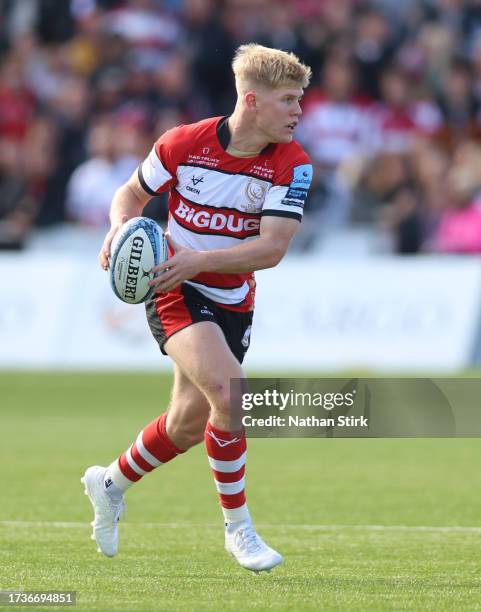 George Barton of Gloucester runs with the ball during the Gallagher Premiership Rugby match between Gloucester Rugby and Harlequins at Kingsholm...