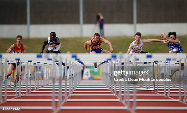 Sebastien Calme of France and Mihai Vlad Chiorpec of Romania compete in the Boys 110m hurdles during the European Youth Olympic Festival held at the...
