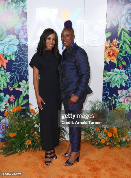 Shaun Robinson and Collette Bowers Zinn attend the 2023 Axis Glow Up Gala at The SoLa Beehive on October 14, 2023 in Los Angeles, California.