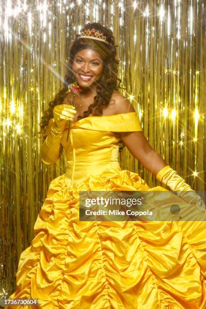 Cosplayer dressed as Disney princess Belle, poses for a photo during New York Comic Con at Javits Center on October 14, 2023 in New York City.