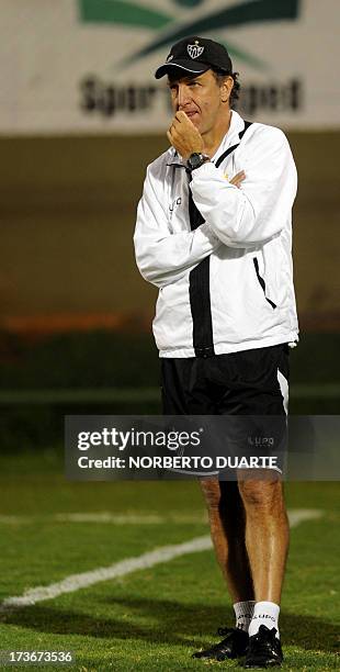 Brazil's Atletico Mineiro coach Cuca, gestures during a training session behind closed doors at the Sportivo Luqueno field, in Luque, on July 16 on...