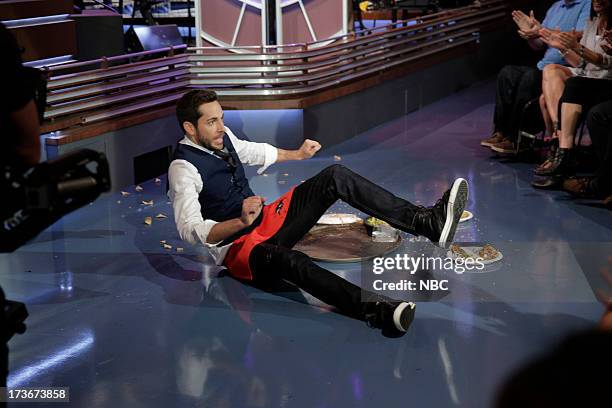 Episode 4496 -- Pictured: Actor Zachary Levi lives out his dream of being a waiter during a skit on July 16, 2013 --