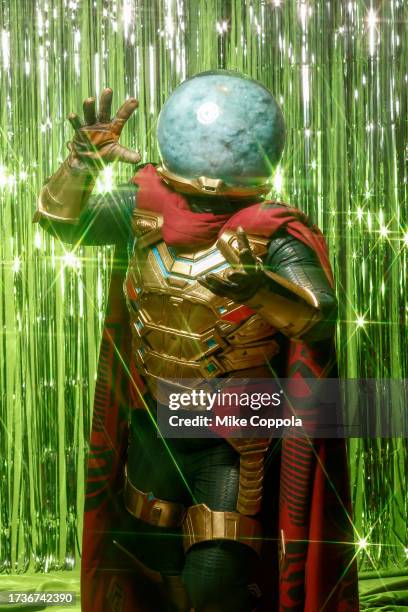 Cosplayer dressed as Mysterio poses for a photo during New York Comic Con at Javits Center on October 14, 2023 in New York City.