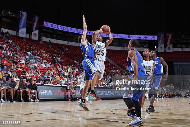 Xavier Silas of the Milwaukee Bucks shoots the ball against the Golden State Warriors during NBA Summer League on July 16, 2013 at the Thomas & Mack...