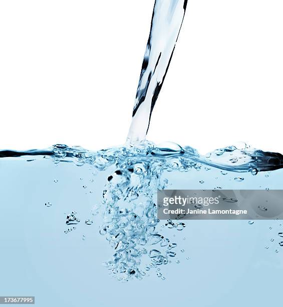 pouring liquid - pouring stock pictures, royalty-free photos & images