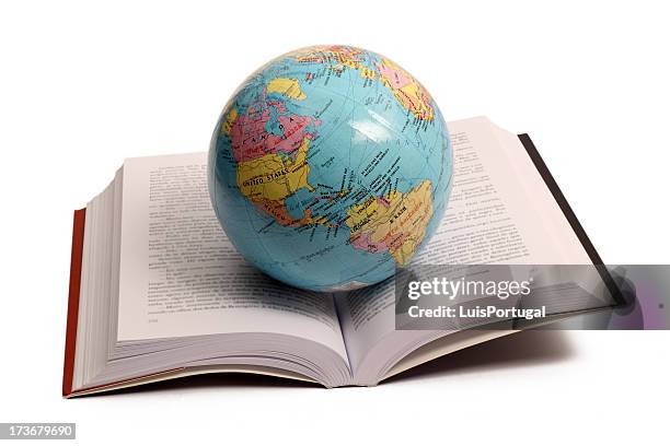 planet and book - world literature stock pictures, royalty-free photos & images