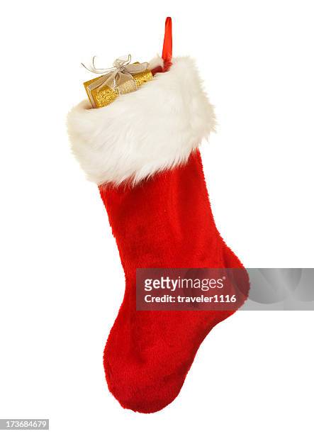 isolated red christmas stocking a holiday ornament - sock texture stock pictures, royalty-free photos & images