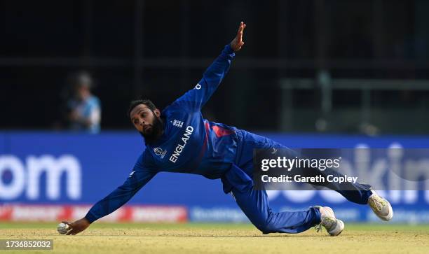Adil Rashid of England fields the ball during the ICC Men's Cricket World Cup India 2023 between England and Afghanistan at Arun Jaitley Stadium on...