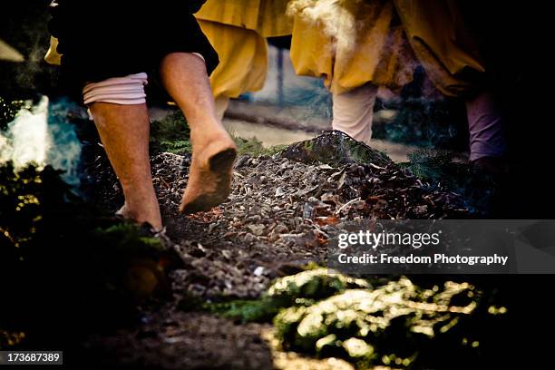 hi-watari-shiki walking over fire ceremony - itsukushima stock-fotos und bilder