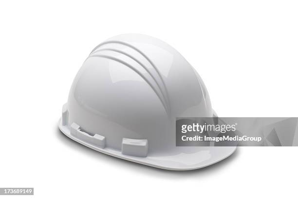 a white fire man's hard hat on a white background - helmet stock pictures, royalty-free photos & images