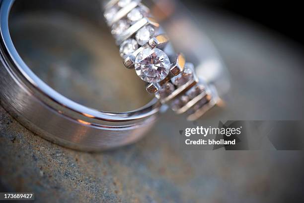 close-up shot of diamond wedding ring and wedding band - metal ore bildbanksfoton och bilder