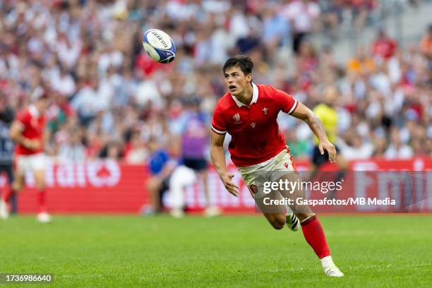 Louis Rees-Zammit of Wales looks at the ball during the Rugby World Cup France 2023 Quarter Final match between Wales and Argentina at Stade...