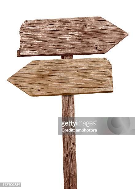 vintage wooden road sign pointing in different directions - 交通標誌 個照片及圖片檔