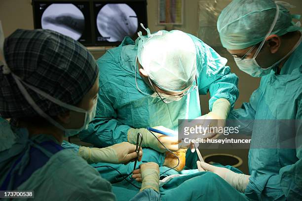 doctors on the operations - surgery stitches stock pictures, royalty-free photos & images