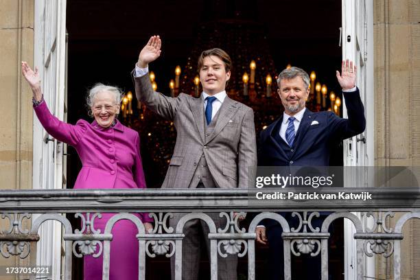 Queen Margrethe of Denmark, Prince Christian of Denmark, and Crown Prince Frederik of Denmark on the balcony of Amalienborg Palace to celebrate the...