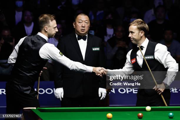 Judd Trump of England poses take pictures in the final match against Ali Carter of England on Day 7 of World Snooker Wuhan open 2023 at Wuhan Stadium...