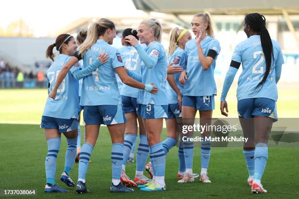 Laia Aleixandri of Manchester City celebrates with teammates after scoring the team's second goal during the Barclays Women's Super League match...