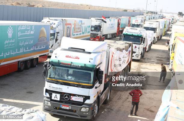 First convoy of relief trucks begins to enter the Gaza Strip from the Egyptian side of the Rafah crossing, in Rafah, Gaza on October 21, 2023. This...