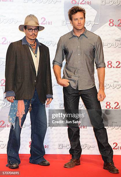 Johnny Depp and Armie Hammer attend 'The Lone Ranger' photo call at the Park Hyatt Hotel on July 17, 2013 in Tokyo, Japan.