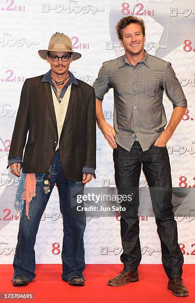 Johnny Depp and Armie Hammer attend 'The Lone Ranger' photo call at the Park Hyatt Hotel on July 17, 2013 in Tokyo, Japan.