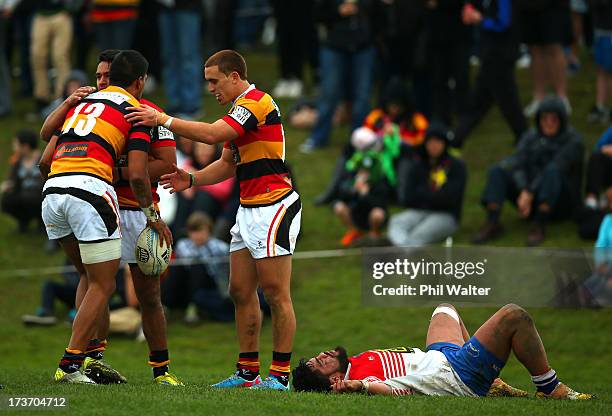 Dylan Collier of Waikato is congratulated on his try as Aaron Kearney of Horowhenua-Kapiti lies on the ground during the Ranfurly Shield match...