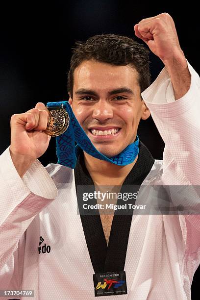 Uriel Adriano of Mexico reacts after winning the gold medal men 74 kg category of WTF World Taekwondo Championships 2013 at the exhibitions Center on...