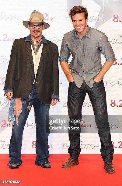 Johnny Depp and Armie Hammer attend 'The Lone Ranger' photo call at the Park Hyatt Hotel on July 17, 2013 in Tokyo, Japan.