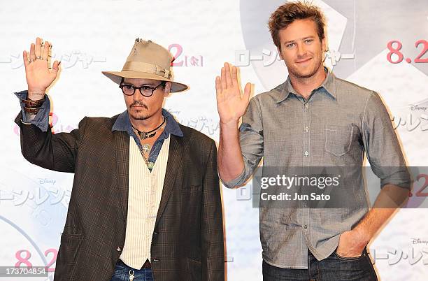 Johnny Depp and Armie Hammer attend 'The Lone Ranger' photo call at the Park Hyatt Hotel on July 17, 2013 in Tokyo, Japan.