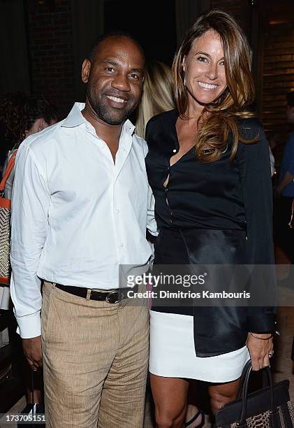Unik Ernest and Kelly Bensimon attend the after party for The Cinema Society & Bally screening of Summit Entertainment's "Red 2" at the Refinery...