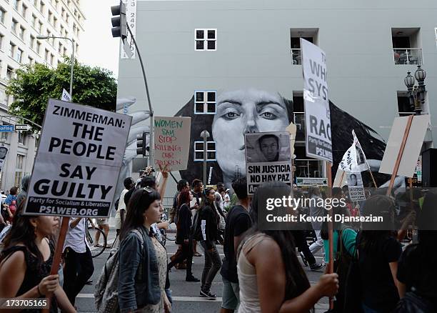 Demonstrators march in the streets of Downtown Los Angeles against the acquittal of George Zimmerman in the shooting death of Florida teen Trayvon...